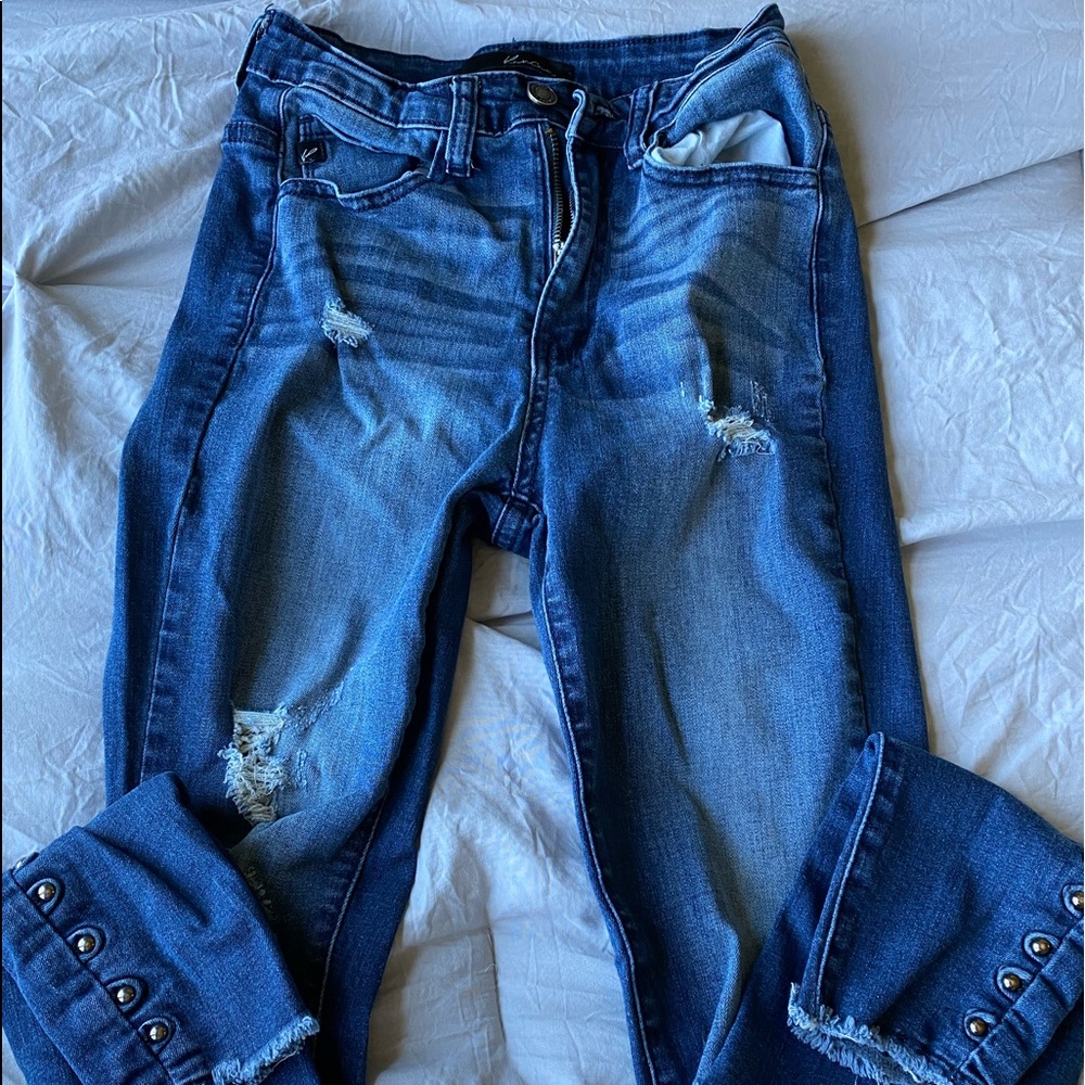 ripped skinny jeans with bead accents